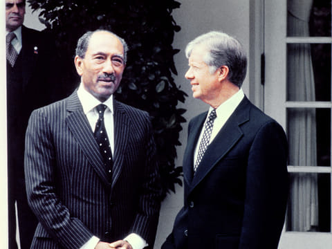 Egyptian President Anwar Sadat (L) and US President Jimmy Carter (R) meet prior to talks on the Mideast situation, on April 08, 1980 in Washington DC.