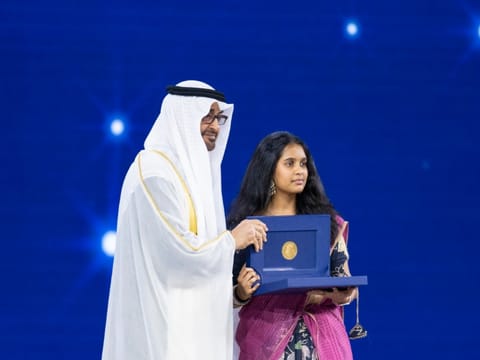 Sheikh Mohamed presents the 2025 Zayed Sustainability Prize for Middle East and Northern Africa Global High Schools, to Monica Akkineni, representing Merryland International School, in Abu Dhabi on January 14