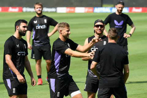 Englands Joe Root (3L) and captain Jos Buttler (3R) gesture during a practice session on the eve of their One-Day International match against India at Vidarbha Cricket Association Stadium in Nagpur on Wednesday.