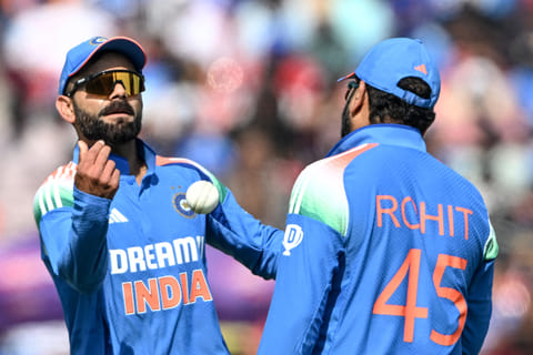India's Virat Kohli (L) with Rohit Sharma.