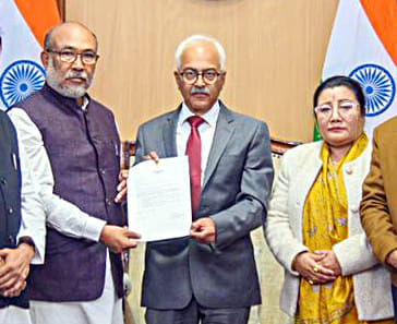 Manipur CM N Biren Singh hands over the letter of resignation from the post of Chief Minister to Governor Ajay Kumar Bhalla, at Raj Bhavan in Imphal on Sunday.
