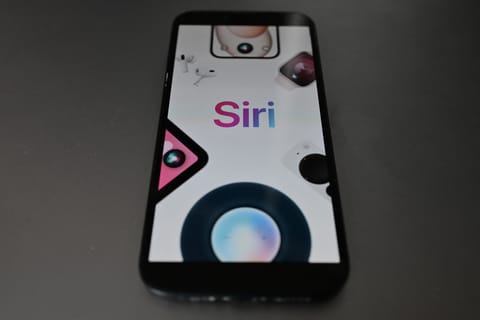 This photograph shows wordmark of Siri, a digital assistant developed by Apple Inc., displayed on a smartphone in Bordeaux, south-western France on February 14, 2025.