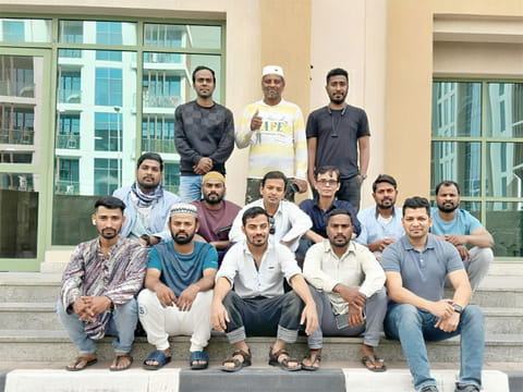 Jahangir Alom, (second from left sitting in the front row) and his group of lucky friends.