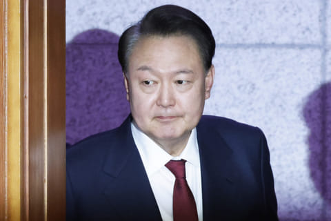 South Korea's impeached President Yoon Suk Yeol arrives to attend the fourth hearing of his impeachment trial over his short-lived imposition of martial law at the Constitutional Court in Seoul on January 23, 2025.