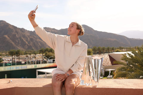 Mirra Andreeva of Russia takes a selfie with the Indian Wells trophy after defeating world No 1 Aryna Sabalenka of Belarus in the final on Sunday.