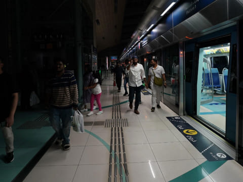 Dubai Metro passengers walk into a dark station as RTA switched off lights at Metro stations, roads and Customer Happiness Centres to observe Earth Hour from 8.30pm to 9.30pm on Saturday.