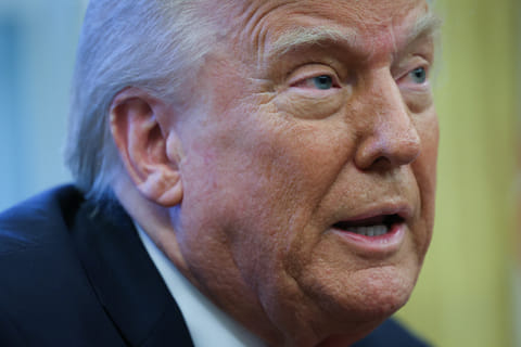 US President Donald Trump speaks to the press after signing an executive order in the Oval Office of the White House in Washington, DC. Trump announced a 100% tariff on "any and all movies made outside of the United States" on Monday (September 29, 2025).
