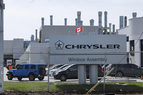 A Canadian flag flies outside the Stellantis Windsor Assembly Plant in Windsor, Ontario, Canada, on April 3, 2025.