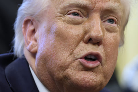 S. President Donald Trump speaks to reporters after signing a proclamation in the Oval Office at the White House.