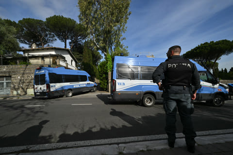 Policemen take position near the Omani embassy in Rome where a second round of nuclear talks between Iran and the United States will be held on April 19, 2025.