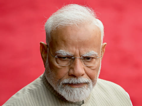 India's Prime Minister Narendra Modi looks on during the ceremonial reception of Angola's President Joao Lourenco at the presidential palace Rashtrapati Bhavan in New Delhi on May 3, 2025.