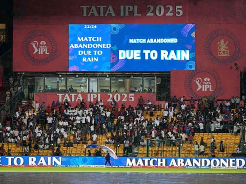 A digital display announces that the Indian Premier League cricket match between Kolkata Knight Riders and Royal Challengers Bengaluru is abandoned due to the rain, at Chinnaswamy Stadium in Bengaluru, India, Saturday, May 17, 2025.
