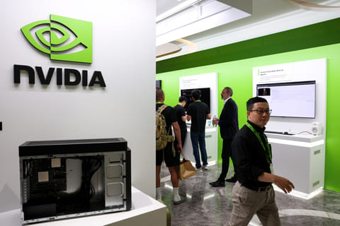 People attend a Nvidia production preview exhibition in Taipei on May 21, 2025.