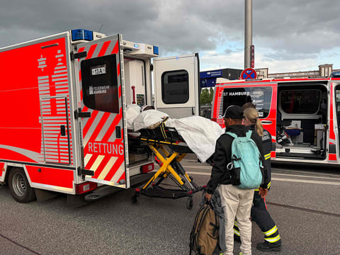 Members of the emergency services work at the scene at Hamburg's main train station where several people have been stabbed on May 23, 2025.