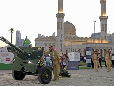 Dubai Police officials at the ceremonial cannon firing for Eid Al Adha. The 901 service received not only phone calls but also 919 emails and 144 live chats via the Dubai Police website.