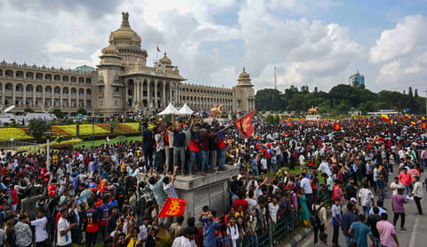 Thousands gather outside the Vidhana Soudha to celebrate with Royal Challengers Bengaluru players winning the Indian Premier League (IPL), in Bengaluru on June 4, 2025.