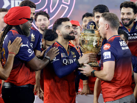 Royal Challengers Bengaluru's Virat Kohli, with former teammates AB de Villiers, Chris Gayle and others, celebrates after winning the Indian Premier League 2025 in Ahmedabad on June 3.
