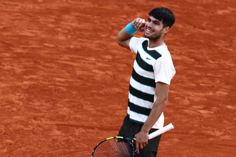Spain's Carlos Alcaraz reacts after winning a point during his men's singles final match against Italy's Jannik Sinner on day 15 of the French Open tennis tournament on Court Philippe-Chatrier at the Roland-Garros Complex in Paris on June 8, 2025.