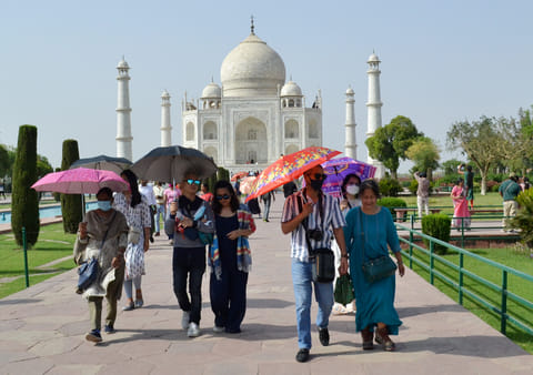Despite the heat, the allure of the Taj Mahal continues to draw thousands of visitors every week.