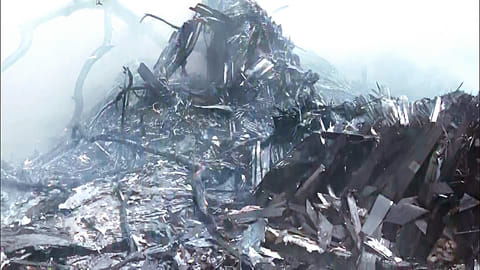 Debris seen after an Air India plane, B787 Aircraft VT-ANB, while operating flight AI-171 from Ahmedabad to Gatwick, had crashed immediately after takeoff with 242 passengers onboard, in Ahmedabad