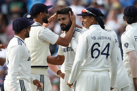 India's Akash Deep (centre) celebrates with teammates after taking the wicket of England's Ben Duckett on Day 4 of the second cricket Test at Edgbaston, Birmingham, on July 5, 2025.