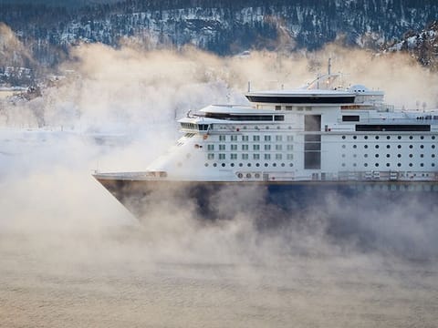 A ship navigating icy waters, highlighting the challenges of route changes and insurance coverage. (Photo for illustration purposes only)