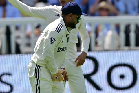 India's Rishabh Pant reacts after having hurt his hand while keeping wicket on the opening day of the third Test at Lord's.