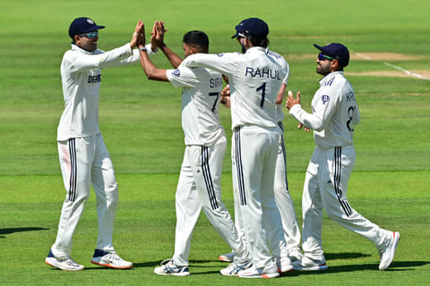 India's Mohammed Siraj (C) celebrates with teammates after taking the wicket of England's Jamie Smith on the second day of the third cricket test match between England and India at Lord's cricket ground in London, on July 11, 2025.