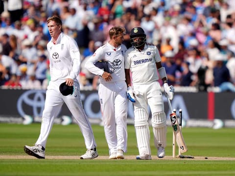 England's Joe Root consoles India's Mohammed Siraj at the end of the third Test at Lord's on Monday.