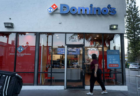 An exterior view of a Domino's pizza restaurant on July 21, 2025 in Miami, Florida.