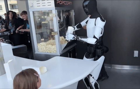 Optimus, a humanoid robot developed by Tesla, demonstrates popcorn making — a glimpse into robotics' advancing capabilities. A recent study by McKinsey highlights that automation like this could transform up to 30% of global work activities by 2030.