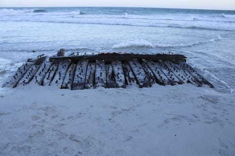 In this image provided by Wessex Archaeology, the Sanday Wreck is seen on the shores of Sanday on Orkney, February 2024.