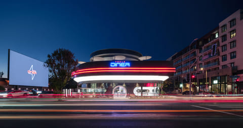 Elon Musk's Tesla Diner unveiled: Step inside Hollywood's retro-futuristic charging hub with robots and movies