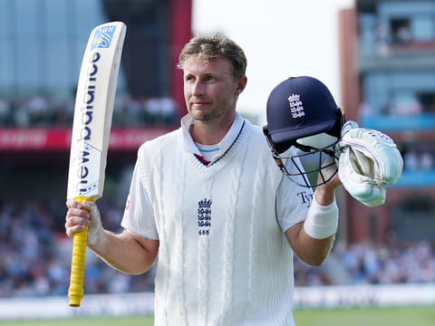 England's Joe Root acknowledge the fans as he walks off the field after losing his wicket on the third day of the fourth Test against India at Emirates Old Trafford, Manchester, England, Friday, July 25, 2025.