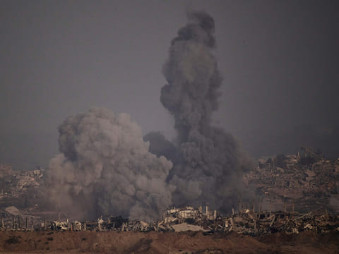 Smoke rises to the sky following an Israeli airstrike in the northern Gaza Strip as seen from southern Israel, on Saturday, July 26, 2025.