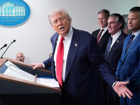 President Donald Trump, from left, speaks with reporters as Army Secretary Dan Driscoll, Interior Secretary Doug Burgum and Defense Secretary Pete Hegseth listen in the James Brady Press Briefing Room at the White House in Washington.