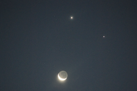 While binoculars or telescopes can enhance the view, the triangle will be easily visible to the naked eye