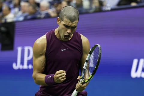 Carlos Alcaraz of Spain reacts against Reilly Opelka of the United States during the first round of the US Open on Monday.