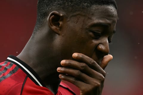 Manchester United's English midfielder #37 Kobbie Mainoo leaves the field at the end of the English Premier League football match between Manchester United and Burnley at Old Trafford in Manchester, north west England, on August 30, 2025.