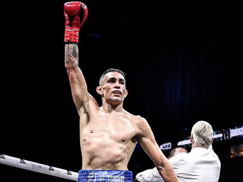 Toney Ferguson gets the TKO win in his boxing debut.