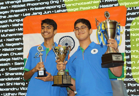 Madhav (right) clinched the championship in the penultimate round, finishing with an impressive 21 wins from 24 rounds.