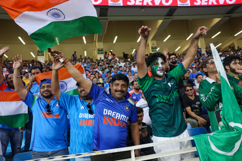 Indian and Pakistani fans together enjoy the India vs Pakistan clash at Dubai International Stadium during the DP World Asia Cup on Sunday.