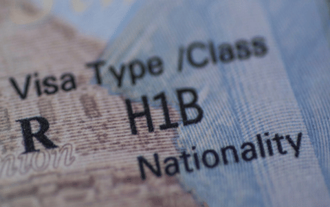 $100,000 H-1B visa fee triggers travel notices for global tech, finance workers