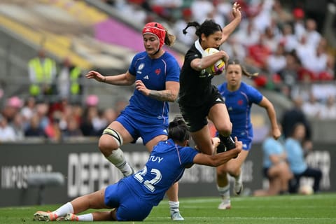 New Zealand's wing Braxton Sorensen-McGee (R) is tackled by France's Lina Tuy during the Women’s Rugby World Cup third-place match between New Zeland and France at The Allianz Stadium, Twickenham, south-west London on September 27, 2025.