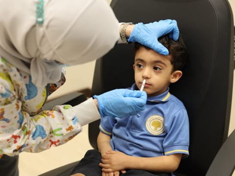 She explained that the flu virus spreads easily among children, especially in schools.