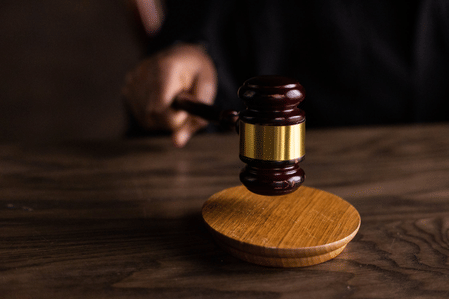The defendant was charged with embezzlement in September 2023.
