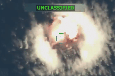A video accompanying US War Secretary Pete Hegseth's post showed a boat floating stationary in the water before a large explosion and subsequent fire.