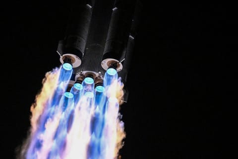 A Long March-2F carrier rocket, carrying the Shenzhou-21 spacecraft and a crew of three astronauts, lifts off from the Jiuquan Satellite Launch Centre in the Gobi desert, in northwest China on October 31, 2025.