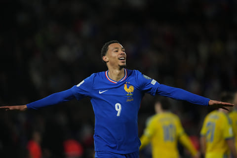 France's Hugo Ekitike celebrates his side's fourth goal during a World Cup 2026 group D qualifying soccer match between France and Ukraine in Paris, Thursday, Nov. 13, 2025.