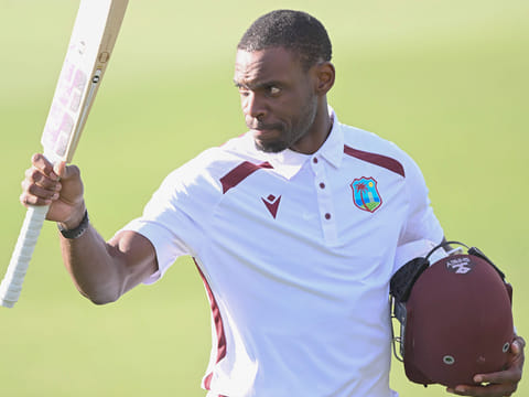West Indies' Justin Greaves raises his bat after scoring 200 runs against New Zealand on Day 5 of the Test match in Christchurch, New Zealand, Saturday, December 6, 2025.